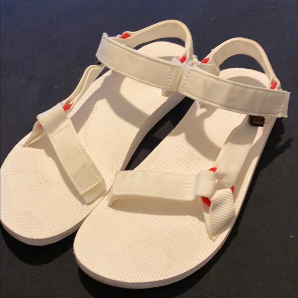 Nice pair of Men’s size 11 White/Red Teva Sandals